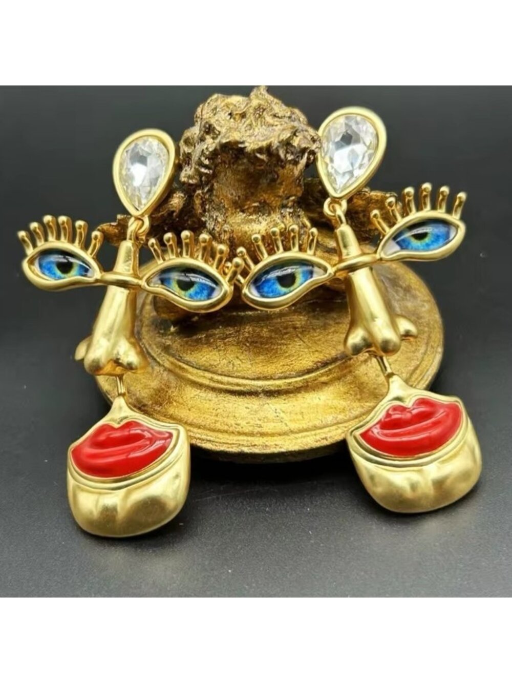 Visage Surrealism Gold Blue Eyes Earrings